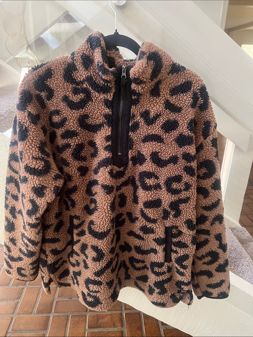 Cozy fuzzy animal print quarter zip